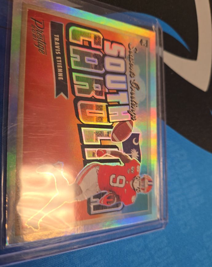 2021 Panini Prestige #SG-8 Travis Etienne Seasons Greetings — front