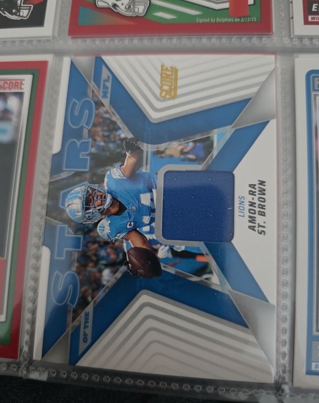 2025 Panini Score #SNJ-ASN Amon-Ra St. Brown — front