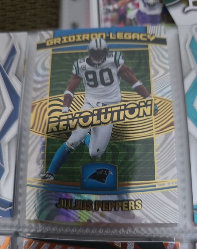 2025 Panini Revolution #21 Julius Peppers Gridiron Legacy — front