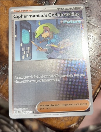 2025 Pokémon #104 Ciphermaniac's Codebreaking — front