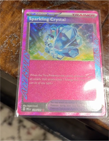 2024 Pokémon TCG Prismatic Evolutions #129 Sparkling Crystal — front