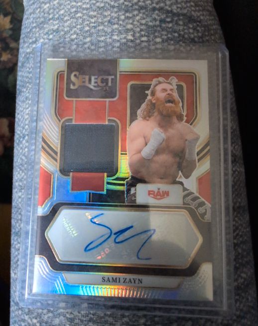 2023 Panini Select WWE Sami Zayn Memorabilia Tie Dye Patch Auto — front