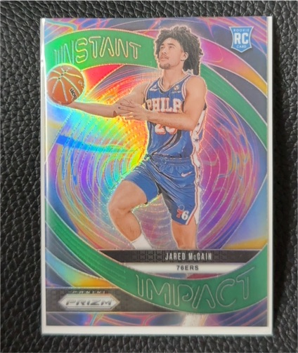 2024-25 Panini Prizm #10 Jared McCain Instant Impact Green Prizm Rookie Card — front