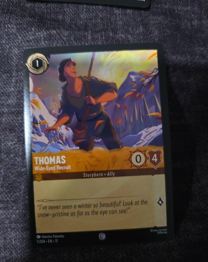 Disney Lorcana Winterspell #1 Thomas - Wide-Eyed Recruit — front