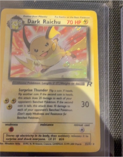 1999 Pokémon Team Rocket #83 Dark Raichu — front