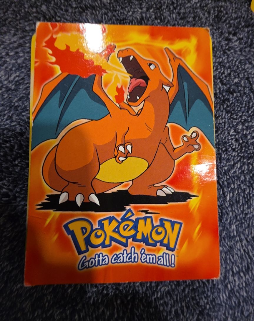 1999 Topps Charizard #E6 — front