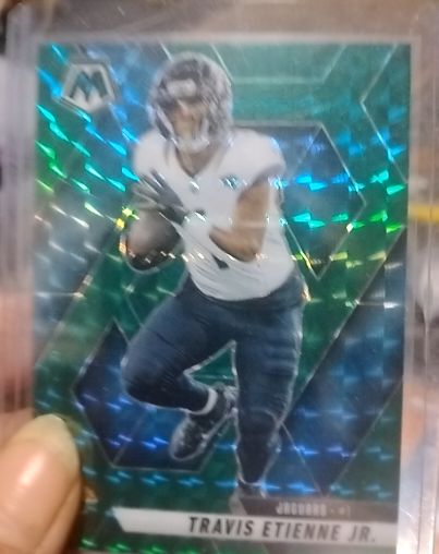2025 Panini Mosaic #121 Travis Etienne Jr. Green Mosaic Prizm — front