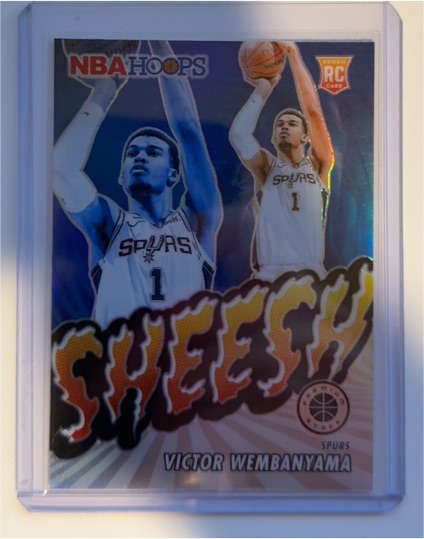2023-24 Panini NBA Hoops Premium Stock #12 Victor Wembanyama Sheesh Silver Prizm Rookie — front