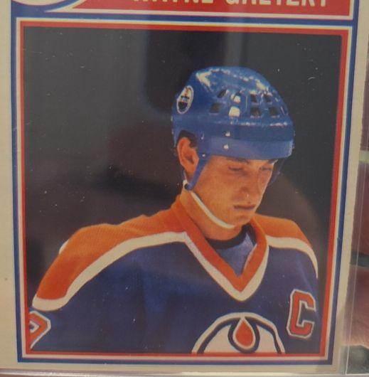 1983-84 O-Pee-Chee Sticker #7 Wayne Gretzky — front