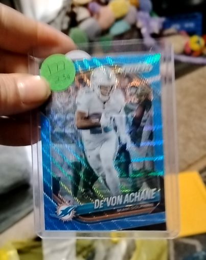 2024 Panini Prizm #12 De'Von Achane Fireworks Green Wave Prizm Miami Dolphins — front