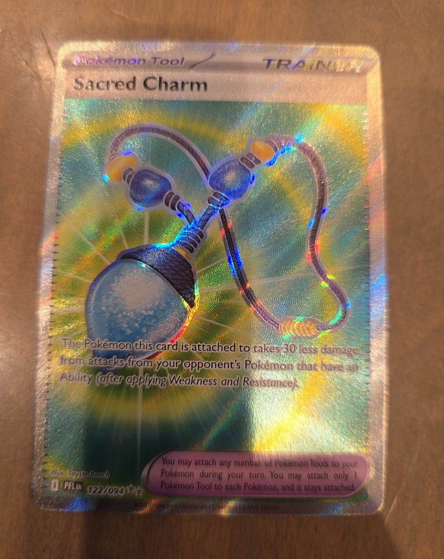 2025 Pokémon TCG #122 Sacred Charm — front