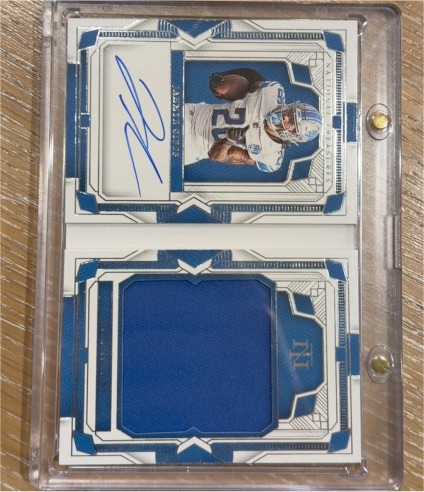 2023 Panini National Treasures Sam LaPorta Rookie Patch Auto Booklet — front