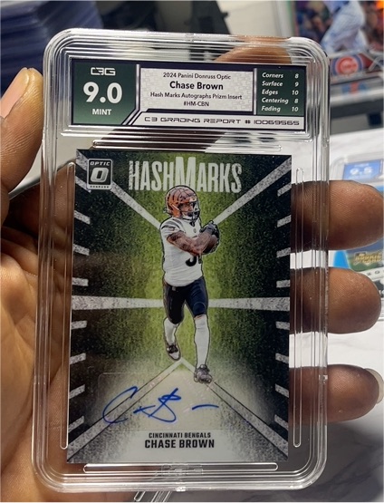 2024 Panini Donruss Optic #HM-CBN Chase Brown Hash Marks Autograph Prizm Insert — front