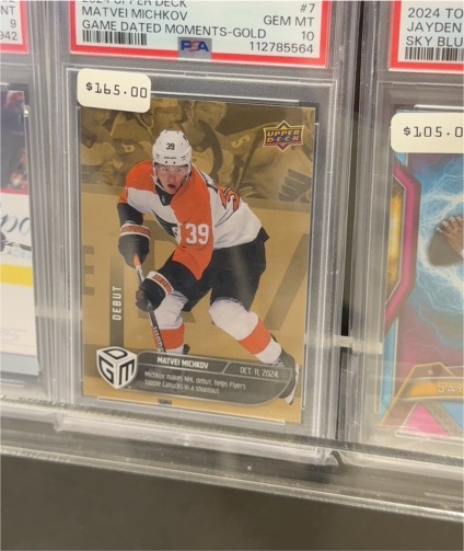 2024-25 Upper Deck Game Dated Moments #7 Matvei Michkov — front