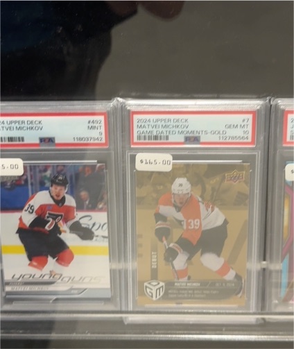 2024 Upper Deck #7 Matvei Michkov Game Dated Moments Gold — front