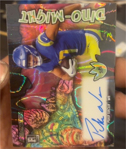 2023 Wild Card Alumination Dino-Might #2/2 Puka Nacua — front