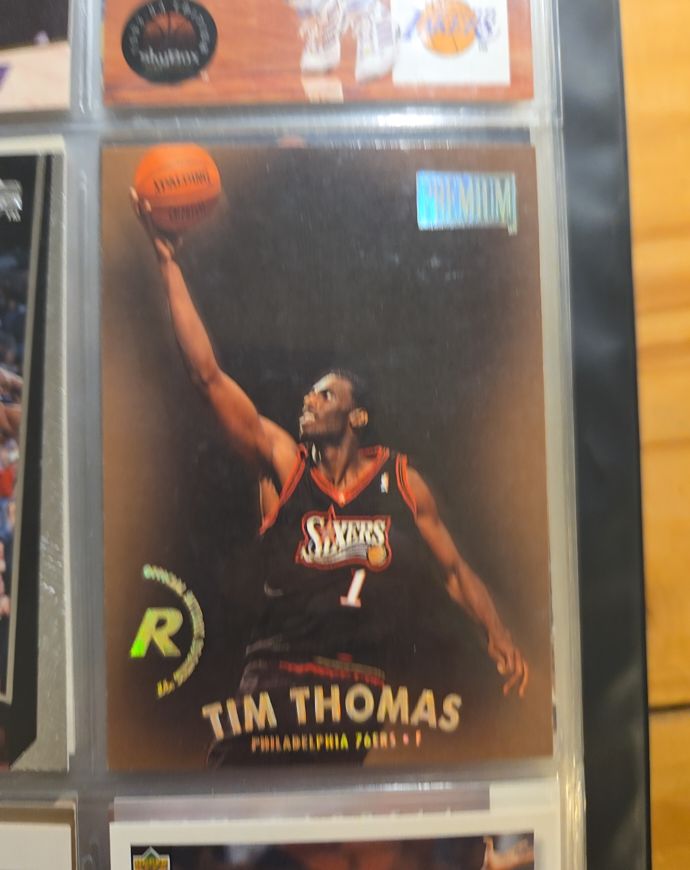 1997-98 Skybox Premium #104 Tim Thomas — front