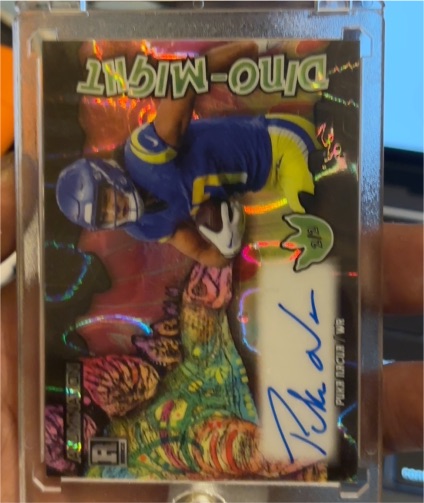 2023 Wild Card Alumination Dino-Might #Dino-Might Puka Nacua — front