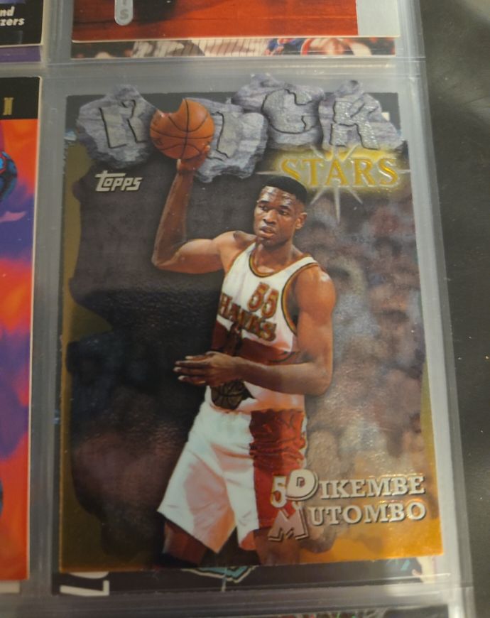 1997 Topps #RS10 Dikembe Mutombo Rock Stars — front