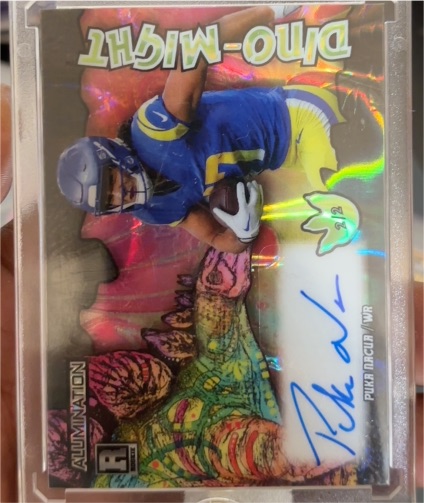 2023 Wild Card Alumination Dino-Might #Dino-Might Puka Nacua — front