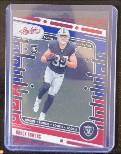 2024 Panini Absolute #113 Brock Bowers Red & Blue Rookie — front