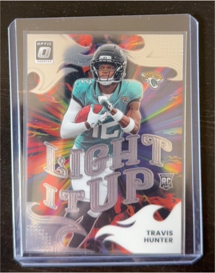 2025 Panini Donruss Optic #4 Travis Hunter Light It Up Rookie Card — front