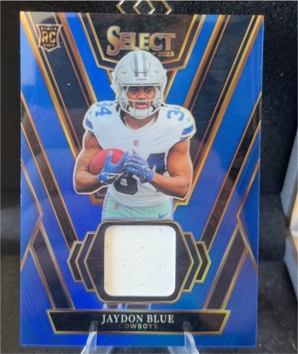 2025 Panini Select #RSW-JBE Jaydon Blue Rookie Swatches — front