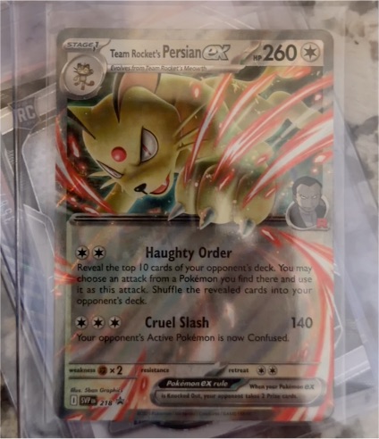 2023 Pokémon TCG Team Rocket's Persian ex #218 — front