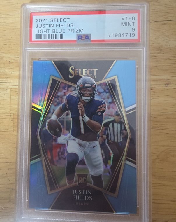 2021 Panini Select #150 Justin Fields Light Blue Prizm — front