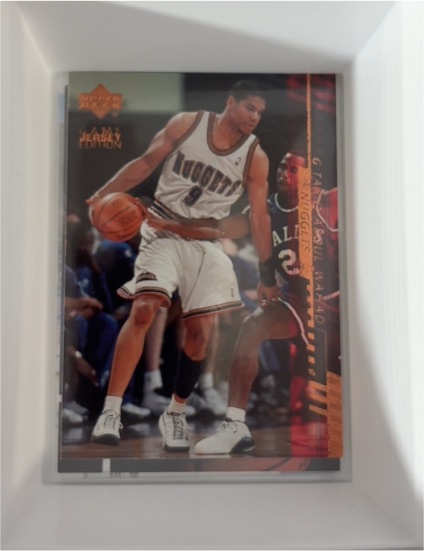 2000-01 Upper Deck Game Jersey Edition #373 Muggsy Bogues — front