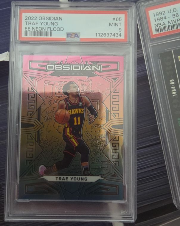 2022 Panini Obsidian #65 Trae Young EE Neon Flood — front