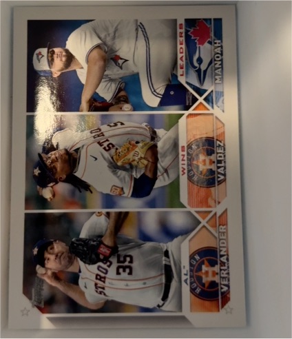 2023 Topps Series 1 #82 AL Wins Leaders Justin Verlander, Framber Valdez, Alek Manoah — front