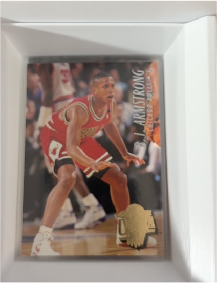 1994-95 SkyBox Premium #21 B.J. Armstrong — front