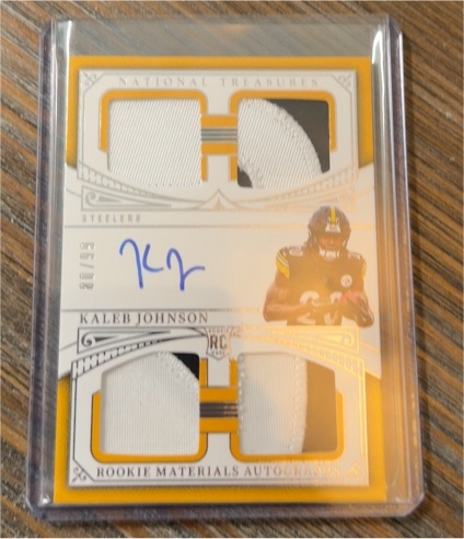 2025 Panini National Treasures #RMAQ-KJN Kaleb Johnson Rookie Materials Autograph Quad Patch — front
