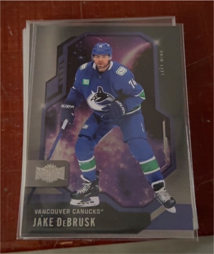 2024-25 Skybox Metal Universe #15 Jake DeBrusk Vancouver Canucks — front