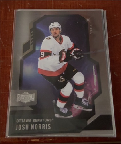 2024-25 Skybox Metal Universe #34 Josh Norris — front