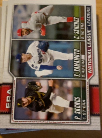 2026 Topps Series 1 #203 National League Leaders ERA Paul Skenes / Yoshinobu Yamamoto / Cristopher Sánchez — front
