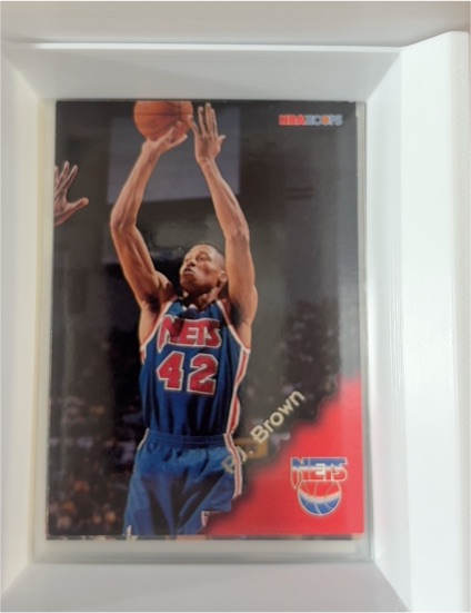 1996-97 Hoops #98 P.J. Brown — front