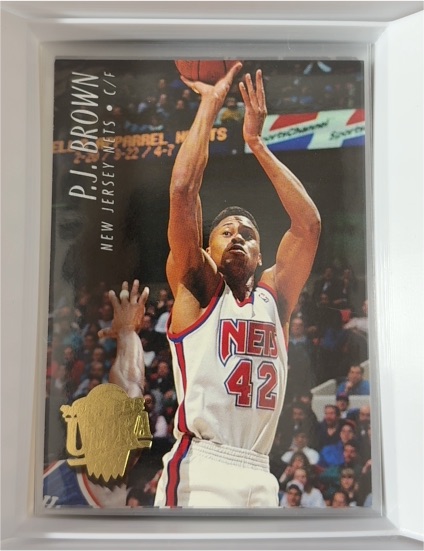 1994-95 SkyBox Premium #104 P.J. Brown — front