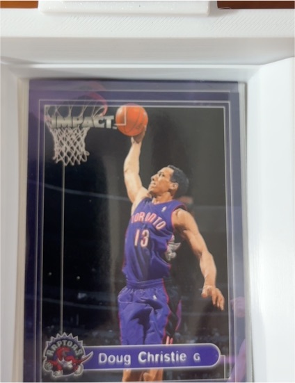 1999-00 Skybox Impact #2 Doug Christie — front