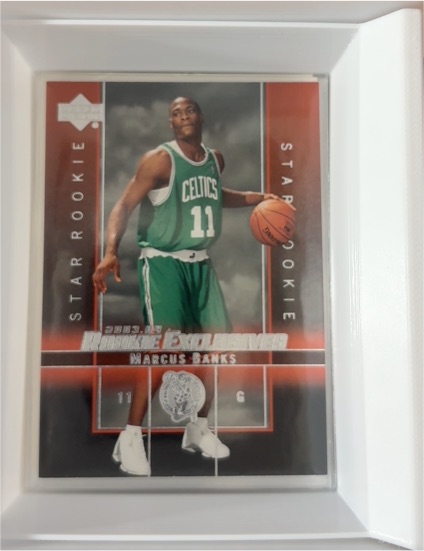 2003-04 Upper Deck Rookie Exclusives #9 Marcus Banks — front