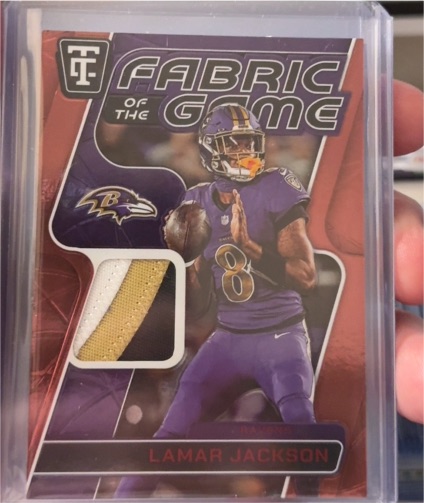 2024 Panini Totally Certified Fabric of the Game #FG-LMJ Lamar Jackson — front