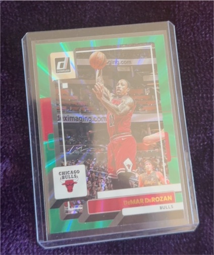 2022-23 Panini Donruss #31 DeMar DeRozan Green Holo Laser Chicago Bulls — front