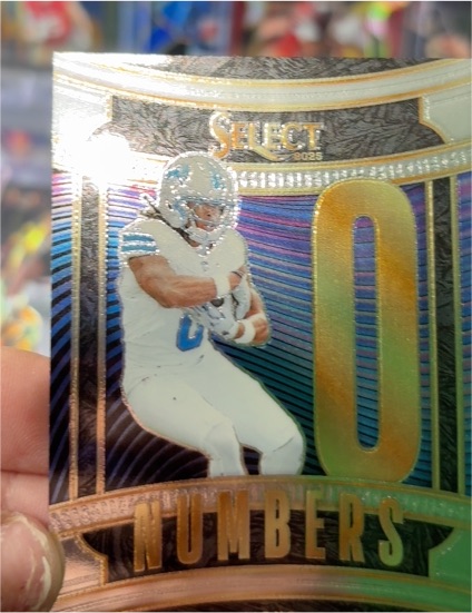 2025 Panini Select #6 Jahmyr Gibbs Select Numbers Insert — front