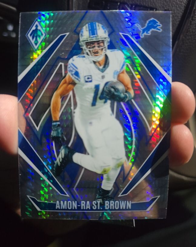 2024 Panini Phoenix #8 Amon-Ra St. Brown — front
