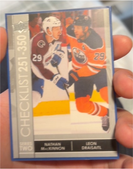 2021-22 Upper Deck Series 2 #449 Nathan MacKinnon / Leon Draisaitl Checklist — front