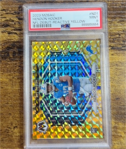 2023 Panini Mosaic #ND1 Hendon Hooker NFL Debut Reactive Yellow — front