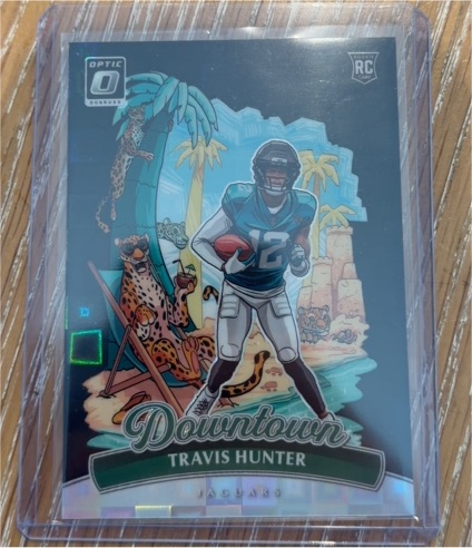 2025 Donruss Optic #13 Travis Hunter Downtown Rookie Card — front