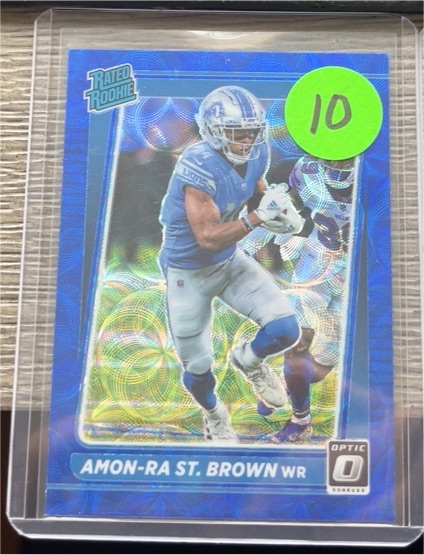 2021 Donruss Optic #228 Amon-Ra St. Brown Blue Scope Rated Rookie — front