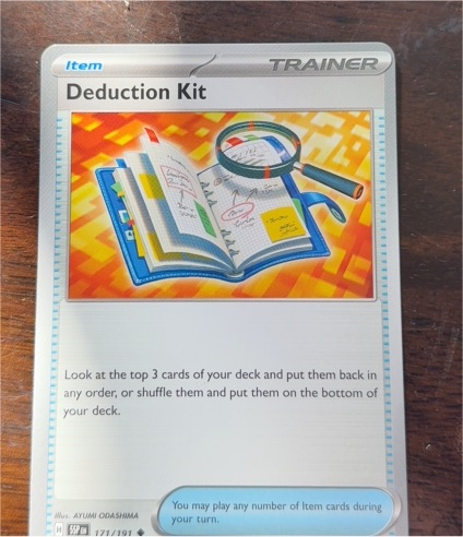 2024 Pokémon SV08: Surging Sparks #171 Deduction Kit — front